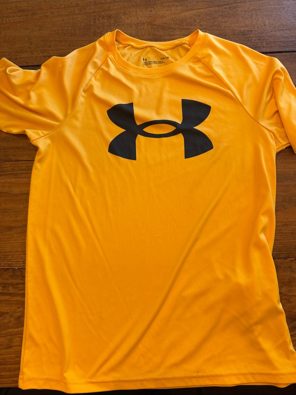 Under Armour boys Short Sleeve Performance Shirt - orange with Black Logo